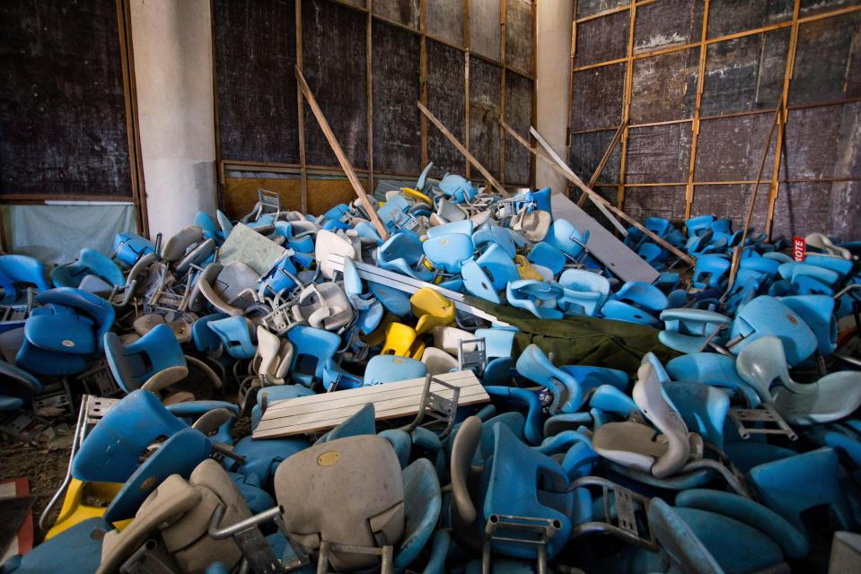  Broken seats have been thrown in a pile at the dilapidated Maracana