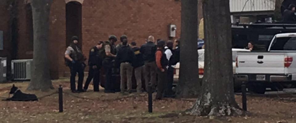  The gunman was taken into custody after storming the credit union building early this morning