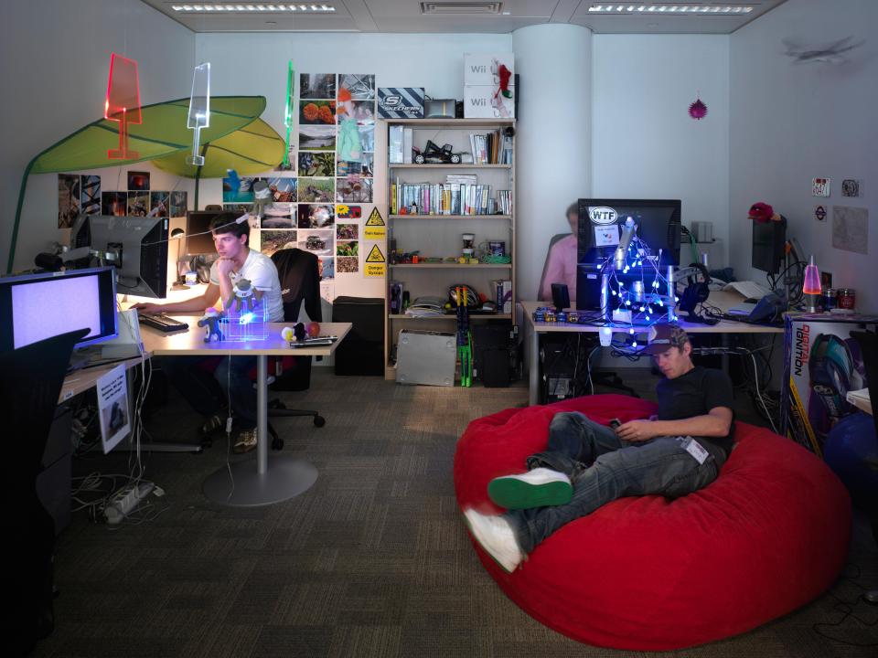  Employees at London's Google hq hard at work at one of the firm's quirky office spaces