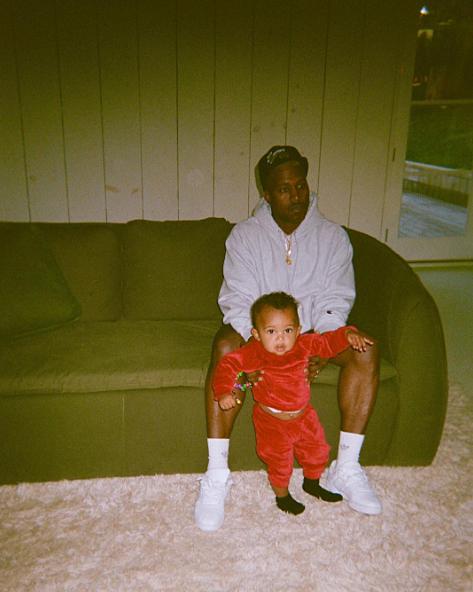  Kanye cuddled up to Saint in a cute photo