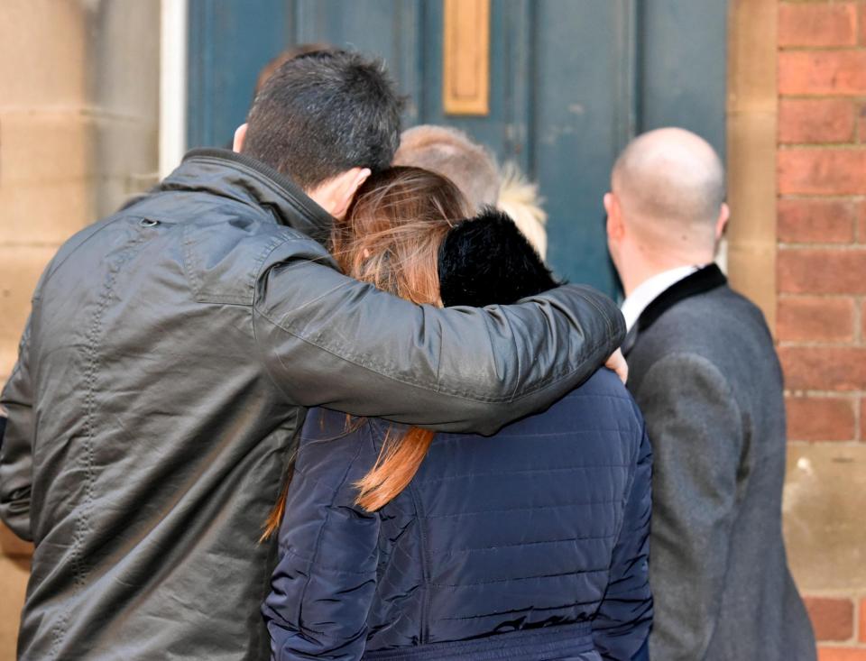  Huddled together, the heartbroken family of Katie headed into court