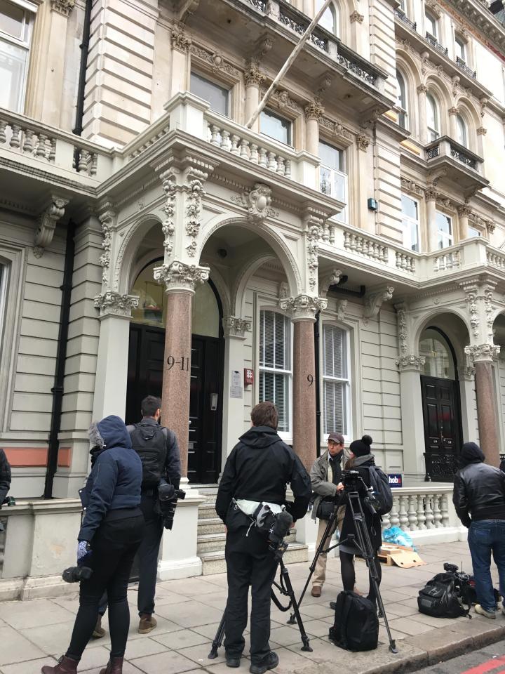  Police were pictured outside the central London head offices today after Steele went on the run