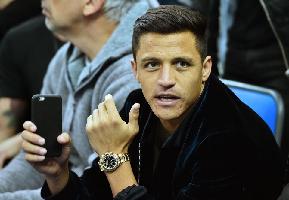  Alexis Sanchez watches the action