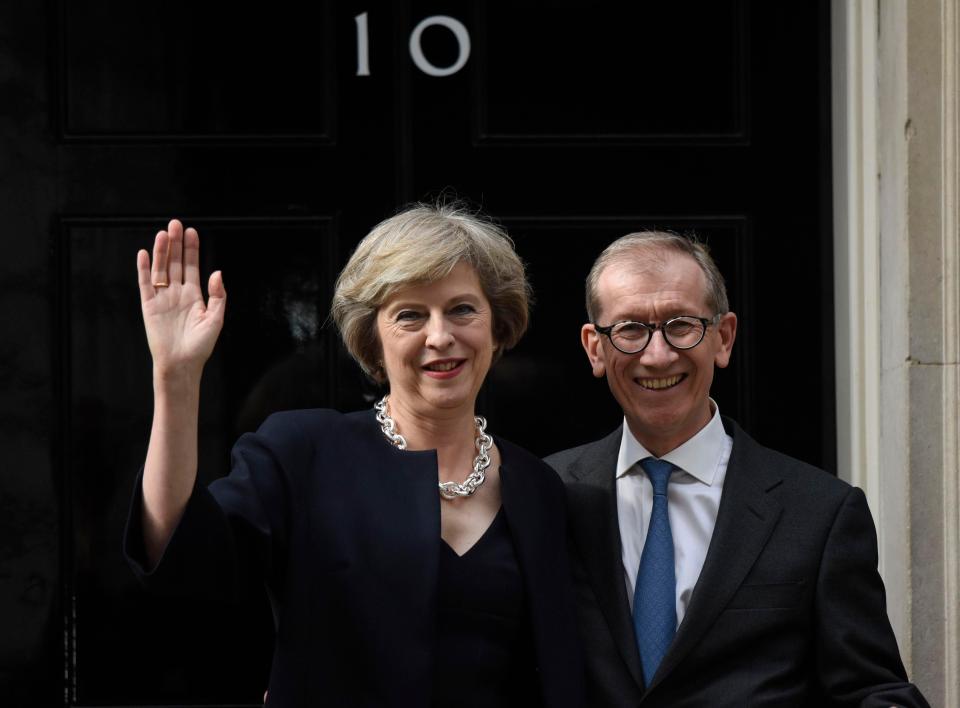  In the hot seat . . . Theresa May with her husband Philip