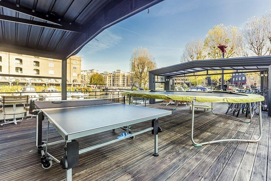  The incredible deck even boasts a table tennis table and trampoline - perfect for entertaining guests of all ages