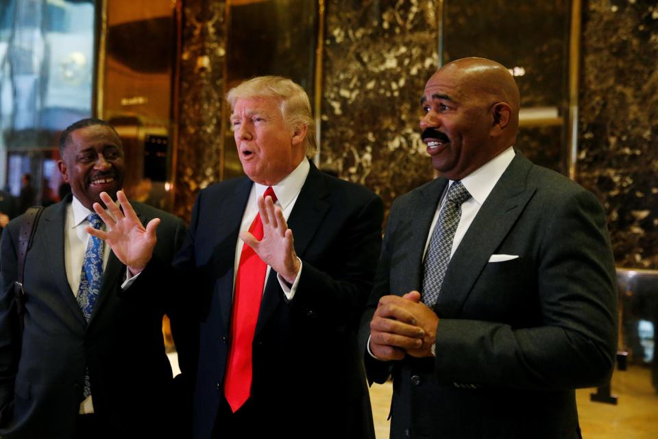  Donald Trump, speaking at Trump Tower yesterday alongside TV personality Steve Harvey (right) and businessman Greg Calhoun, said he may lift Russian sanctions