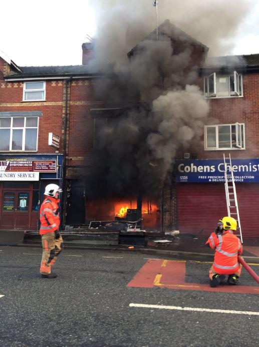  Fire crews in four engines were called to the scene, and the road was closed as the fire raged