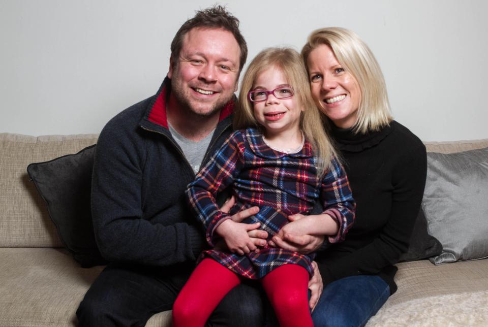 Little Sophia Scott, pictured with her mum and dad Amanda and Darren, was diagnosed with a rare condition similar to Alzheimer's two years ago