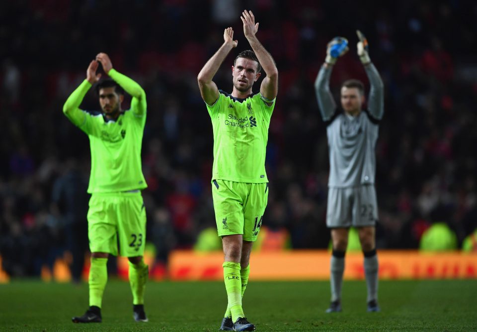  Liverpool players applaud the travelling fans after the game