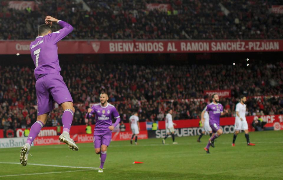  Cristiano Ronaldo celebrates his goal after his penalty opens the scoring against Sevilla