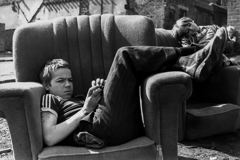  Photographer Tish Murtha's dossier of images of young boys and girls playing on dumped furniture in the city