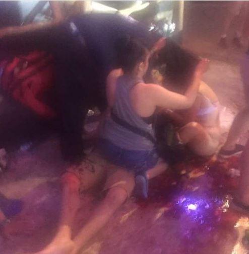  One wounded reveller was seen lying in a pool of blood