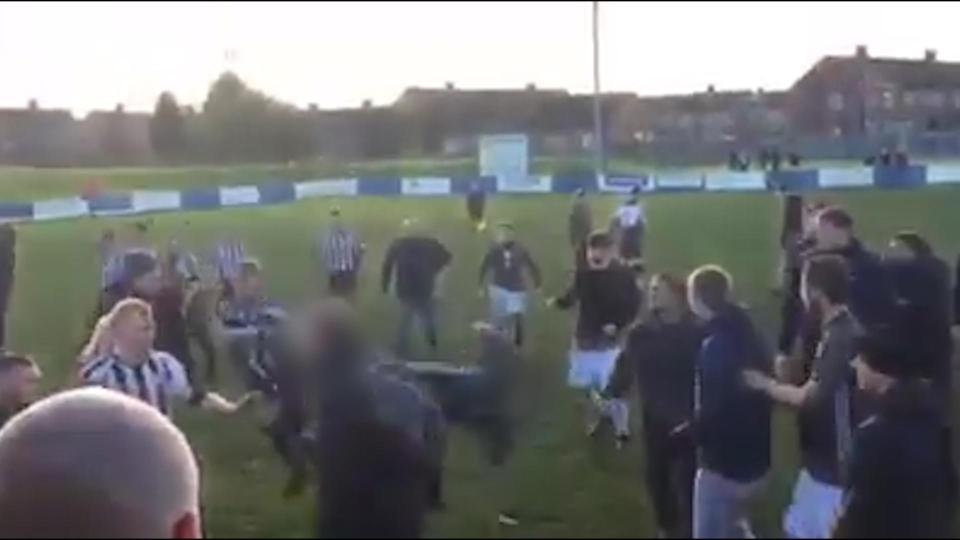 One person appears to launch into a flying kick during the mid-match ruck 