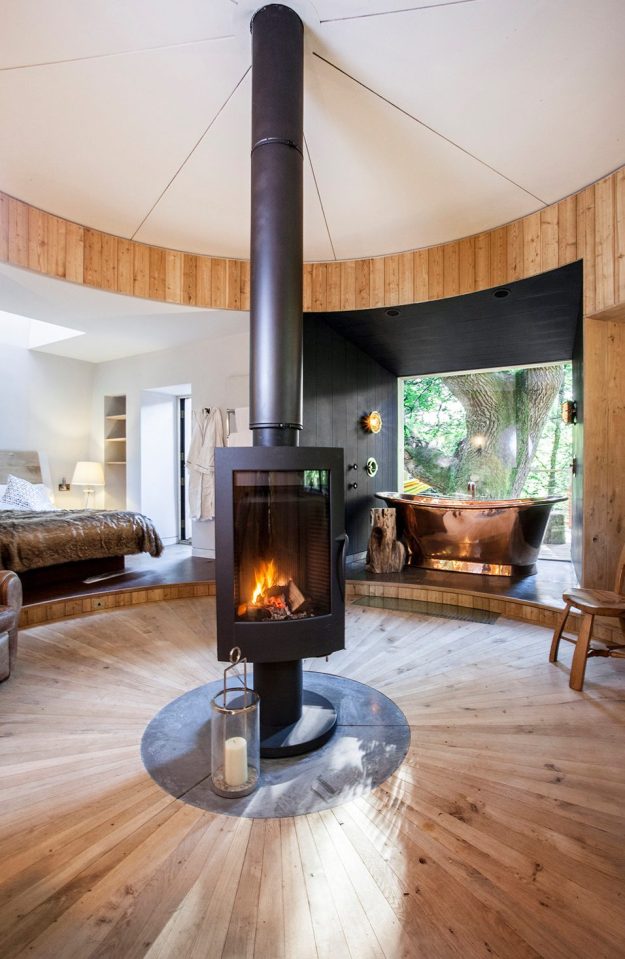  The stylish combination of sustainable craftsmanship and luxurious interiors also includes a hot tub on the upper deck, a revolving woodburner and an open-air tree shower