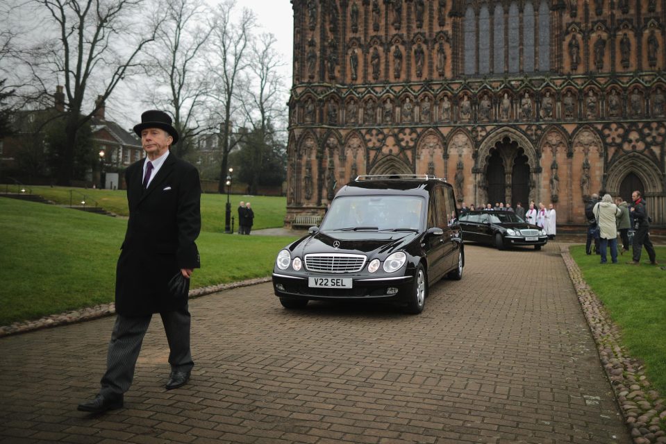 The anthem You'll Never Walk Alone then played as self-proclaimed "Scouser" Ms Saward was carried from the cathedral