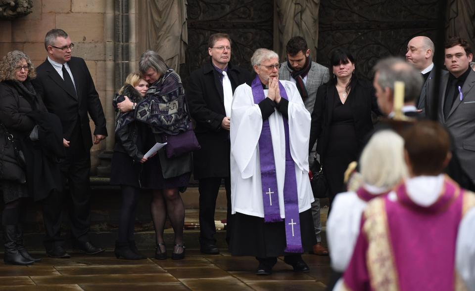 Many of those attending had followed the family's invitation to wear purple, to make a statement against sexual violence