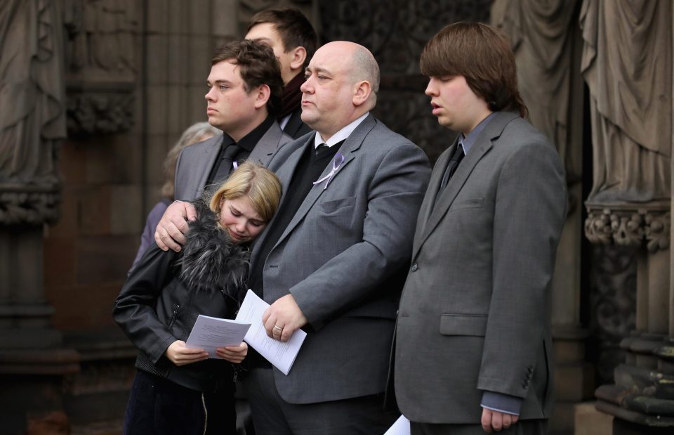 Saward was carried from the cathedral, her coffin adorned with a small bunch of bright flowers, followed by her grieving husband and sons Fergus, Myles and Rory