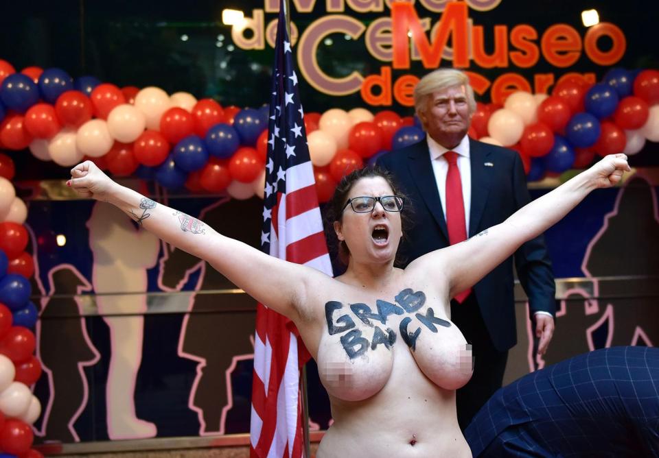  The FEMEN activist called on women to 'grab back' in reference to Trump's infamous 'grab em by the p****' tape