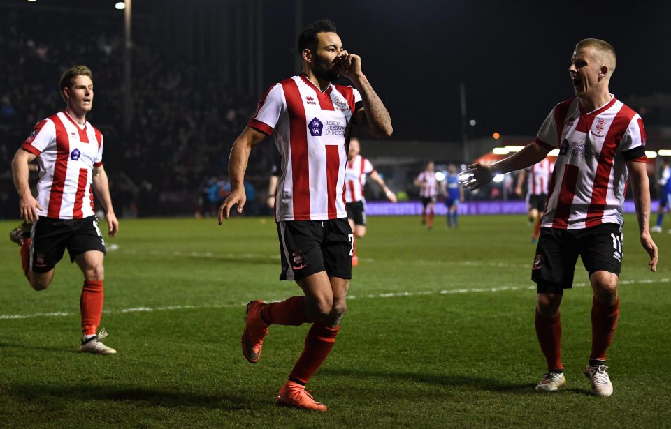  Lincoln striker Nathan Arnold puts himself in FA Cup folklore as he celebrates victory over Championship side Ipswich