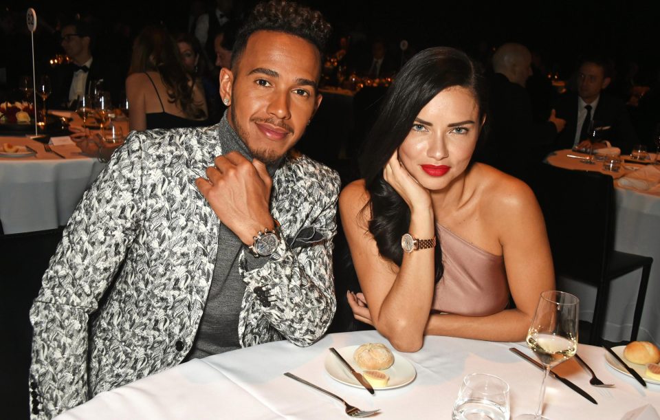  Formula One star Lewis Hamilton poses alongside Victoria Angel supermodel Adriana Lima