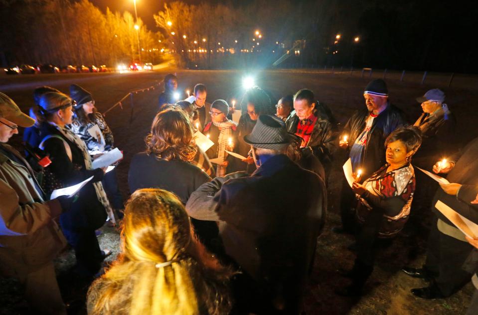  Death penalty protesters held a candle lit vigil for the vicious murderer outside the jail