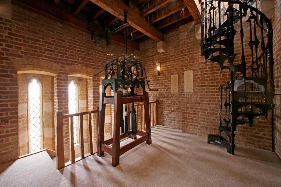  A spiral staircase leads up to a belfry with breath-taking 40-ft high ceilings