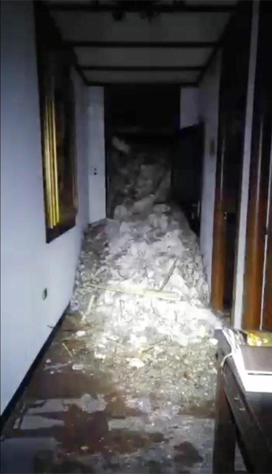  Rescuers have released eerie images from inside the building