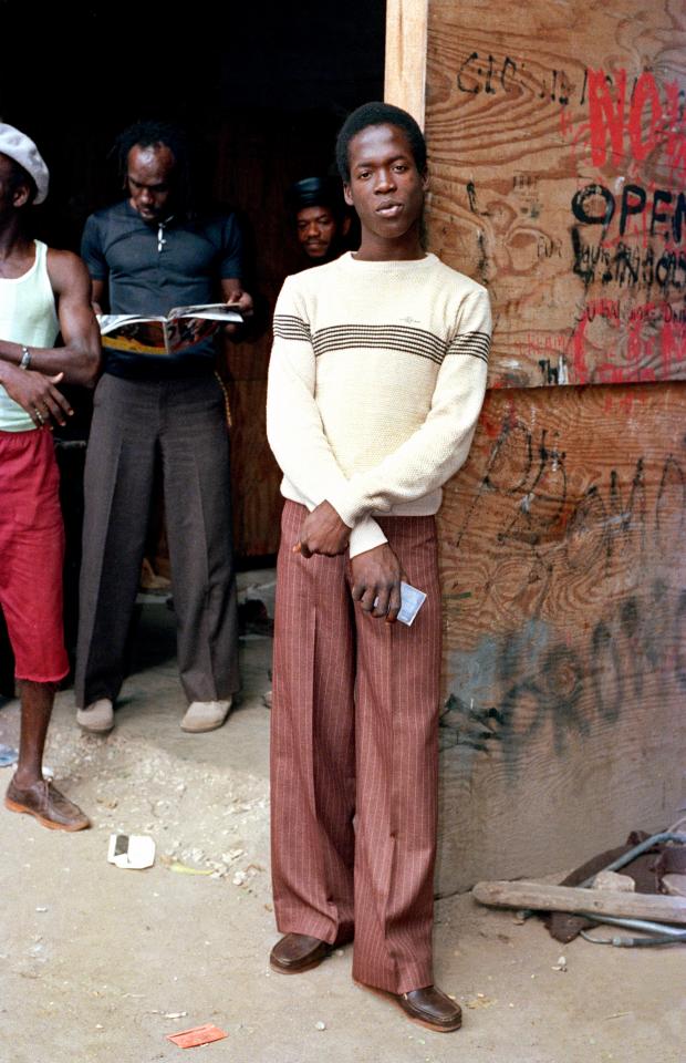  Tenorsaw posing in front of the shed where Youth Promotion stored the speakers and other sound system equipment