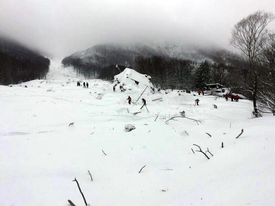  A group of 12 alpine rescuers trekked through the night to first reach the stricken hotel