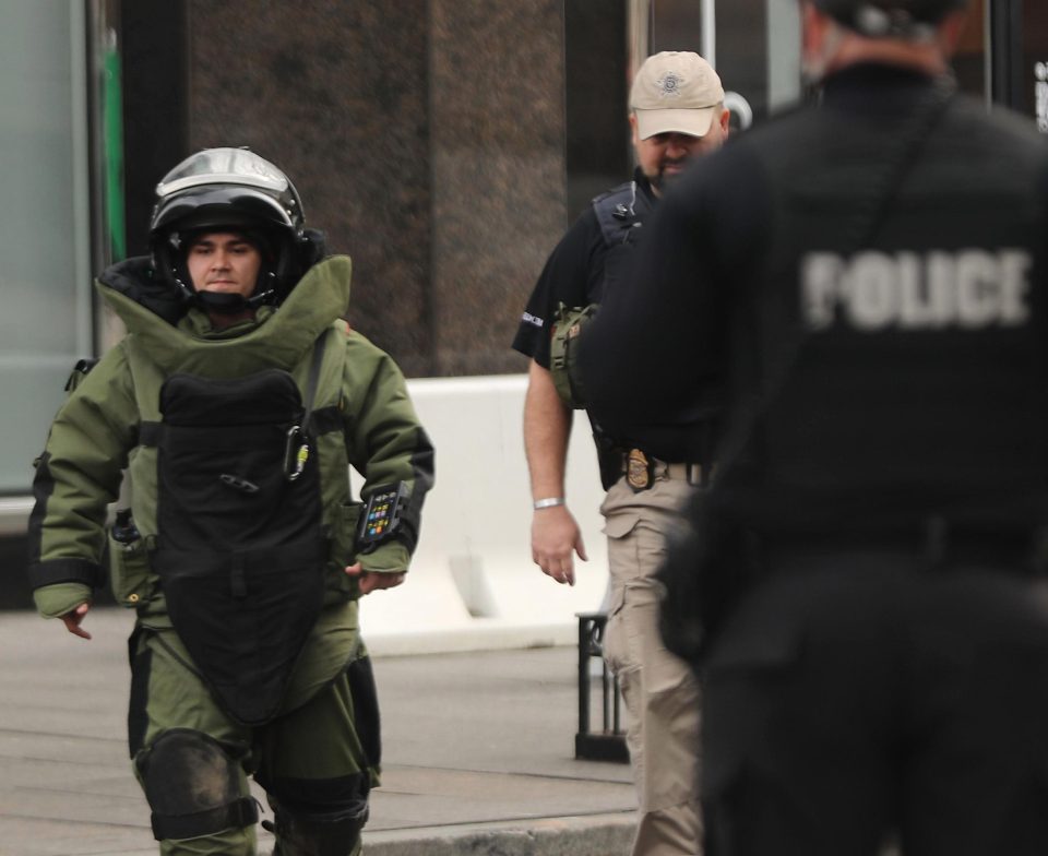  An explosives expert in action after a suspicious package was found in Washington