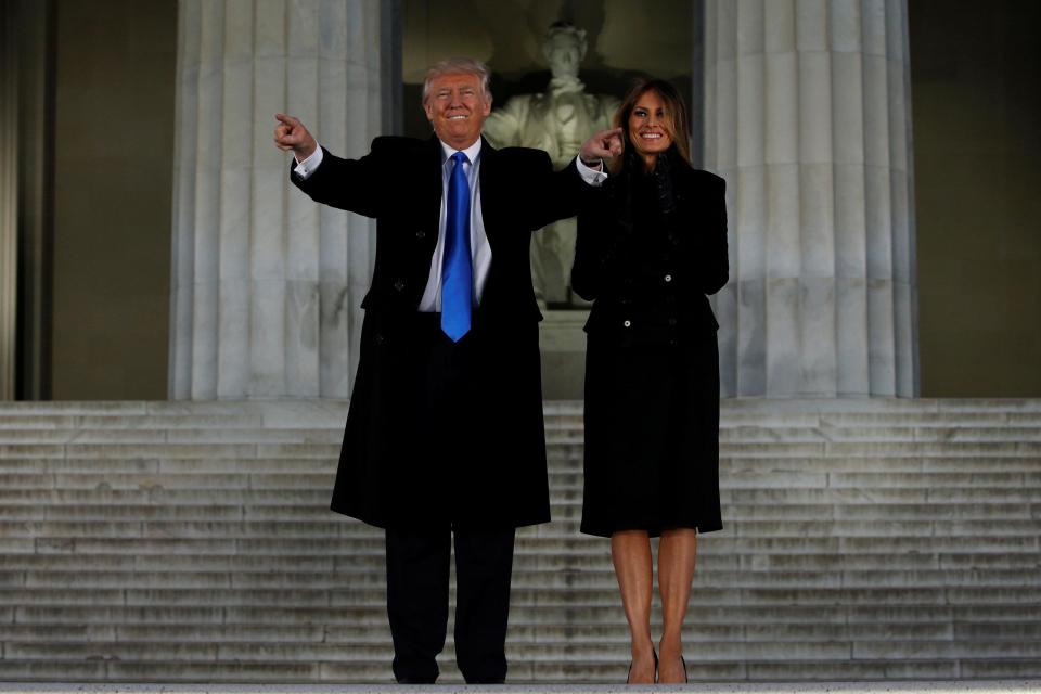  President-elect and wife Melania Trump in high spirits yesterday