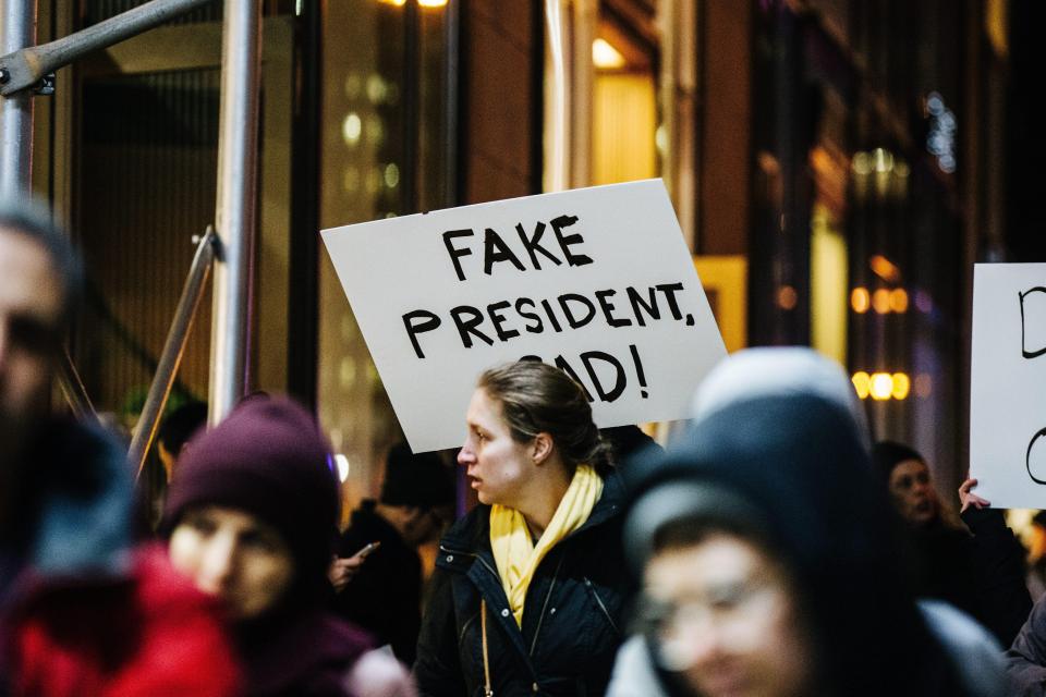  Activists walk the streets with highly emotive signs