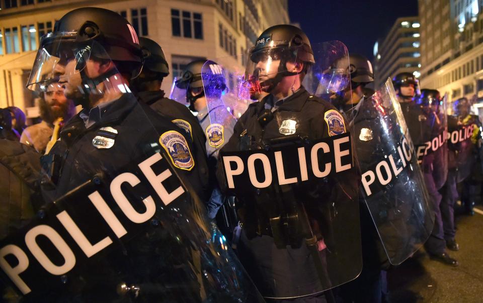  Cops at an anti-Trump protest In Washington last night