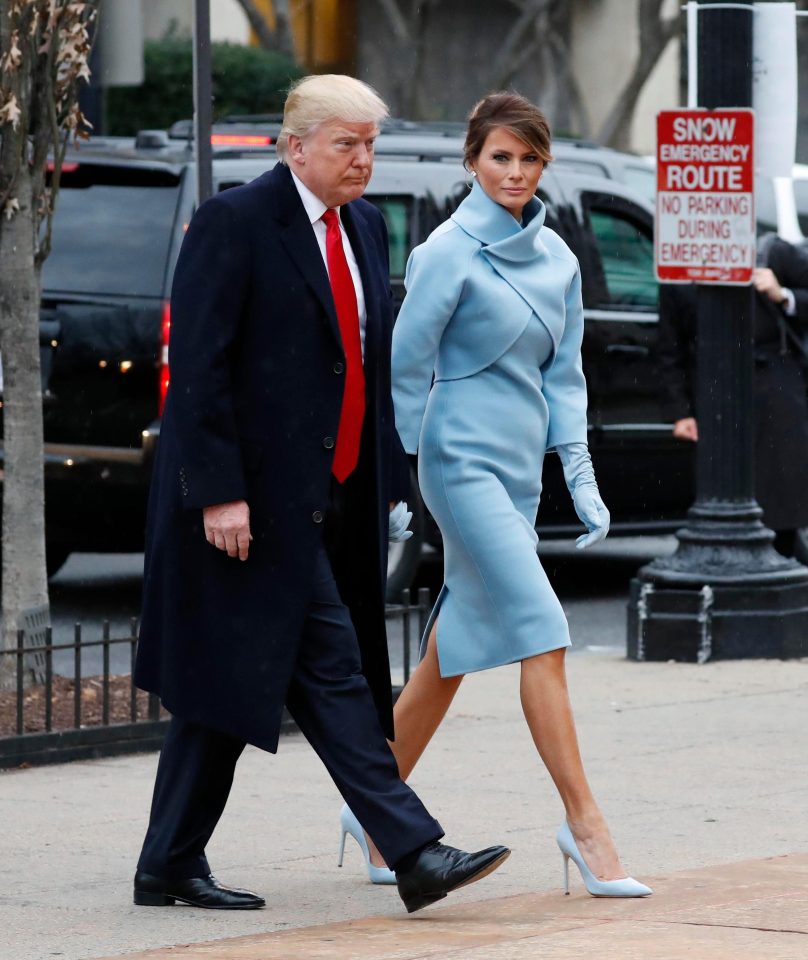  Melania Trump, pictured with husband Donald, looked chic in a high-necked cornflour blue dress believed to be by American designer Ralph Lauren