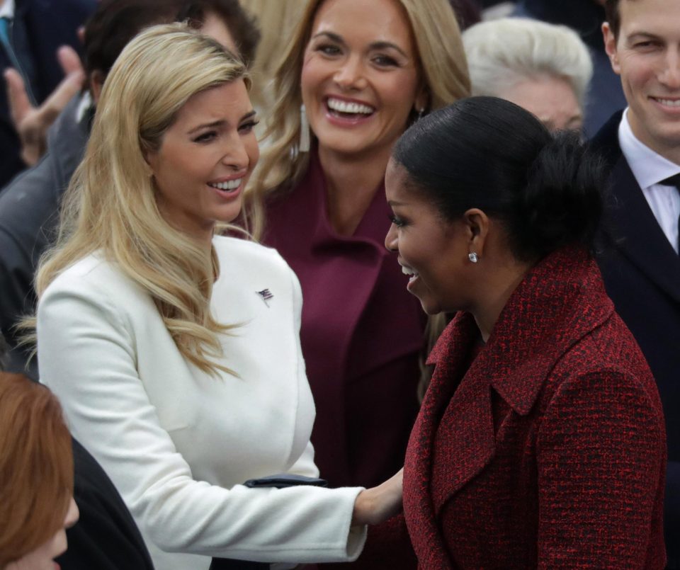  Ivanka shares a joke with the outgoing First Lady Michelle Obama who looked chic in a maroon coat