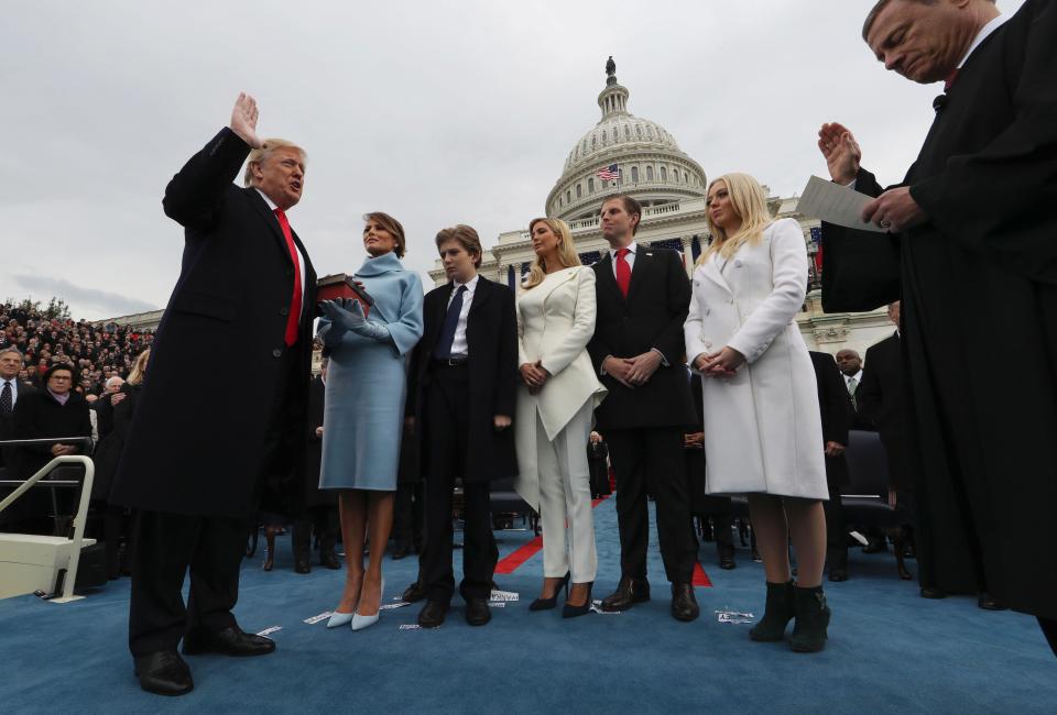  Trump’s children (r-l) Tiffany, Eric, Ivanka and Barron are pictured here with Melania (left) during the Oath of Office