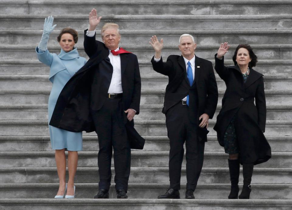  New president Donald Trump waves goodbye to the Obamas with wife Melania, and Vice President Mike Pence and wife Karen