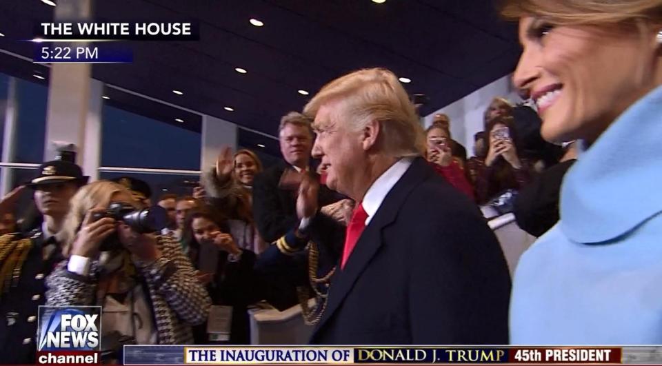  Trump is greeted by the press as he arrives at the White House to begin his term as president