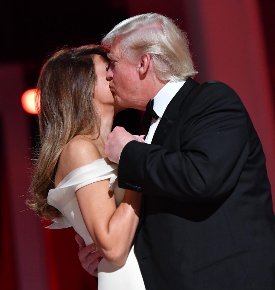  Newly-elected Trump kisses his wife after becoming 45th President of the USA