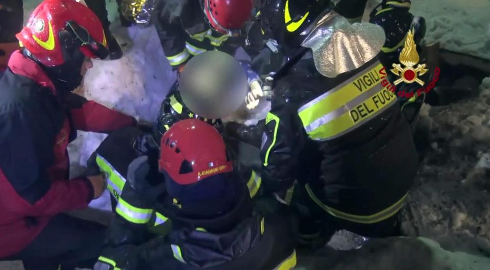  Moment another survivor is taken from the 'coffin hotel' in Italy