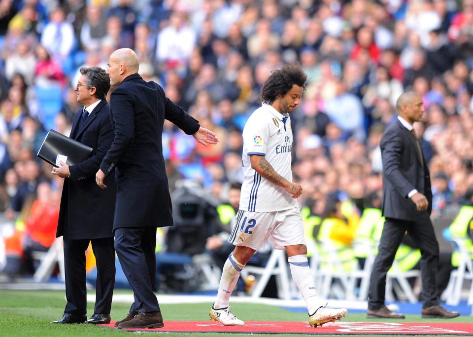 Marcelo is forced off with an injury during Real Madrid's win over Malaga