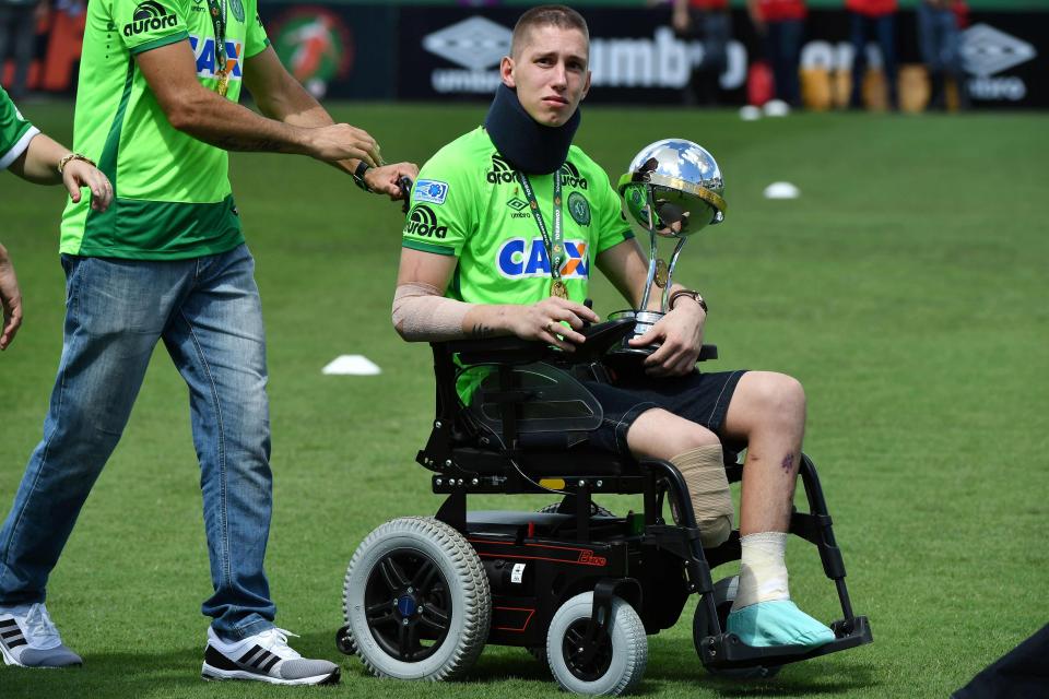  Chapecoense goalkeeper Jackson Follmann lifts the Copa Sudamericana before their friendly against Palmeiras