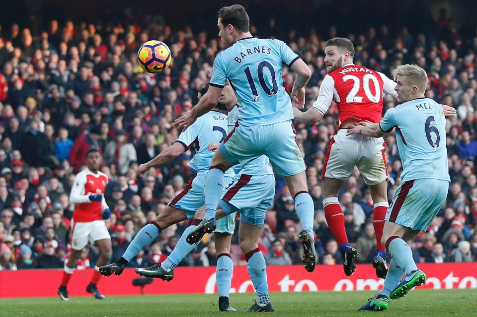 Mustafi rises at the near post to head home Ozil's corner