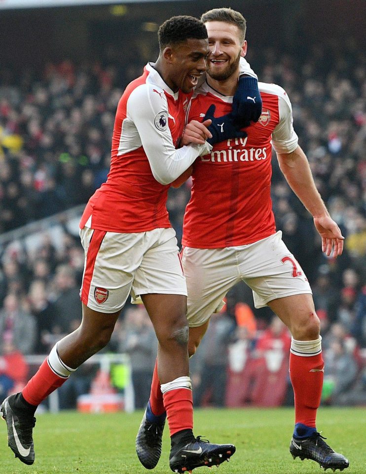 Well done, mate...Mustafi celebrates his goal with Alex Iwobi