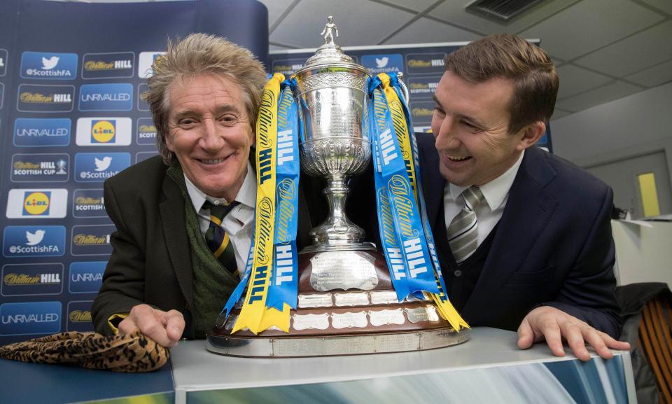  Rod Stewart posing with the iconic Scottish Cup ahead of the draw with Alan Stubbs