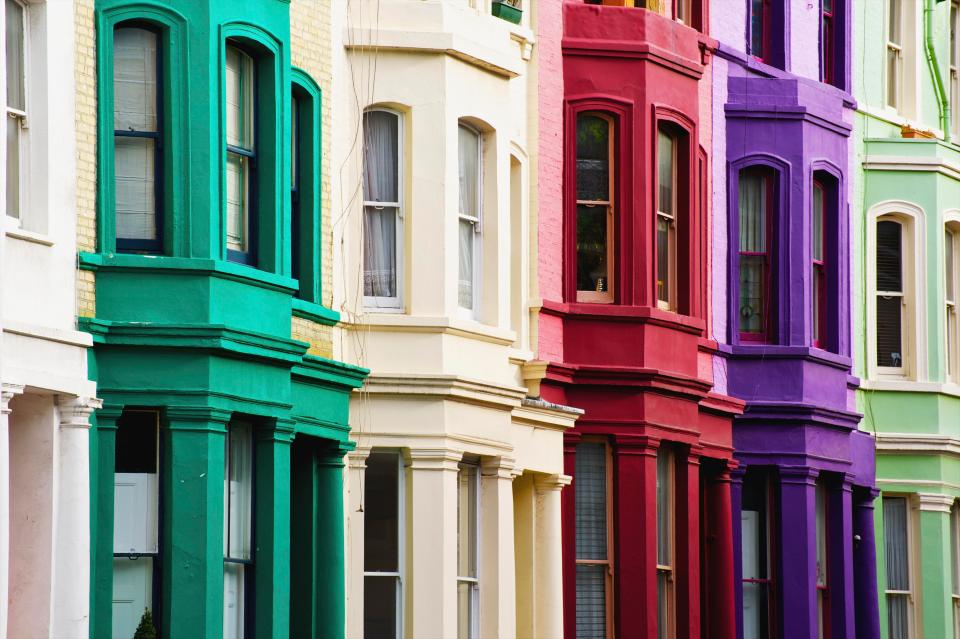  A row of colourful houses in Notting Hill, London