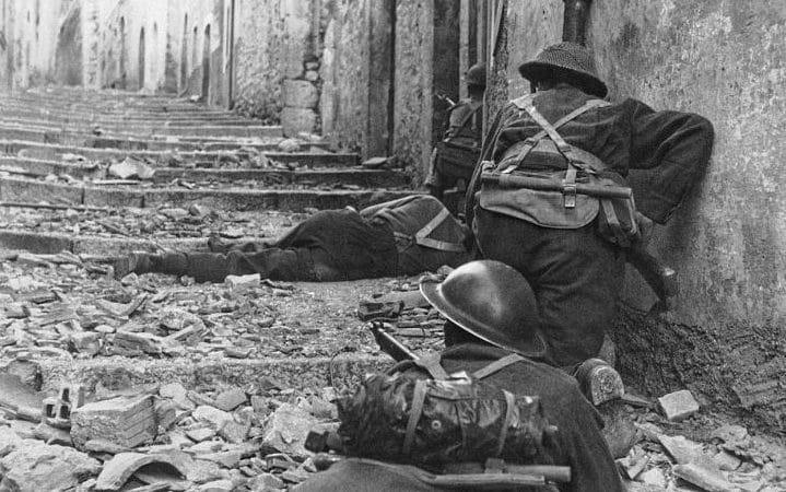  1943: Canadian infantrymen advance cautiously up a narrow lane in Campochiaro