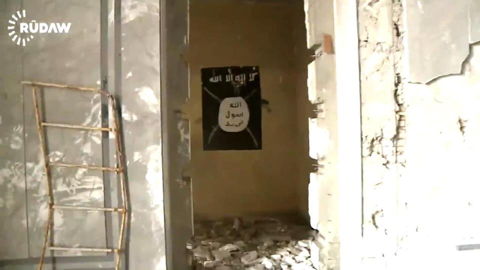  An ISIS flag adorns a wall