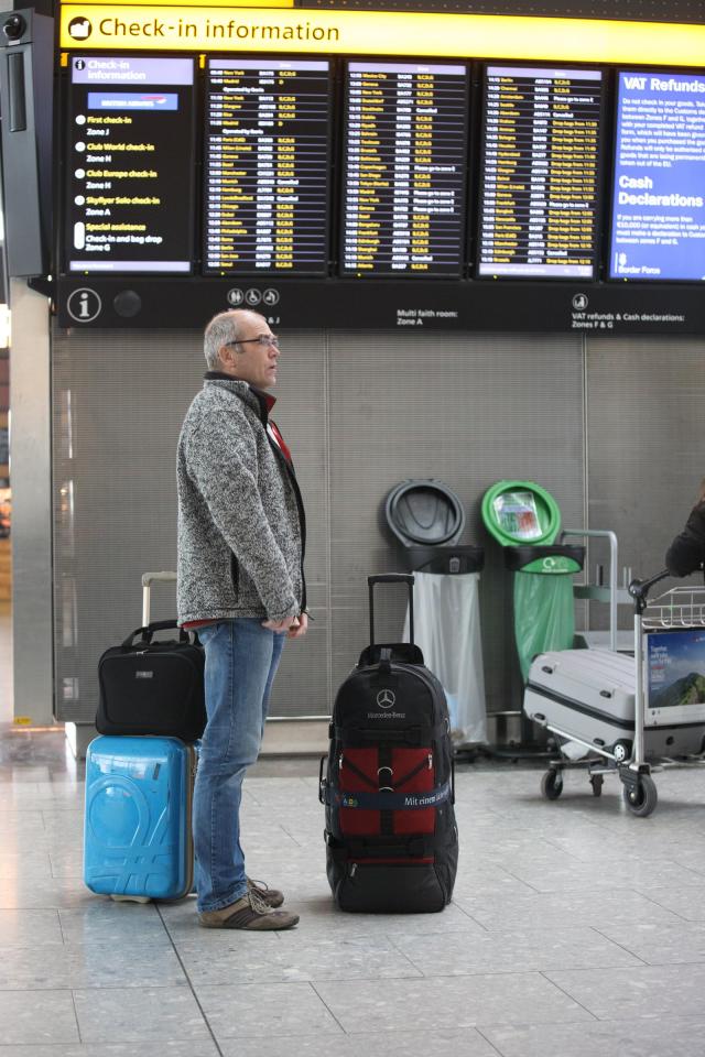  British Airways passengers wait for delayed flights in Heathrow Airport Terminal 5