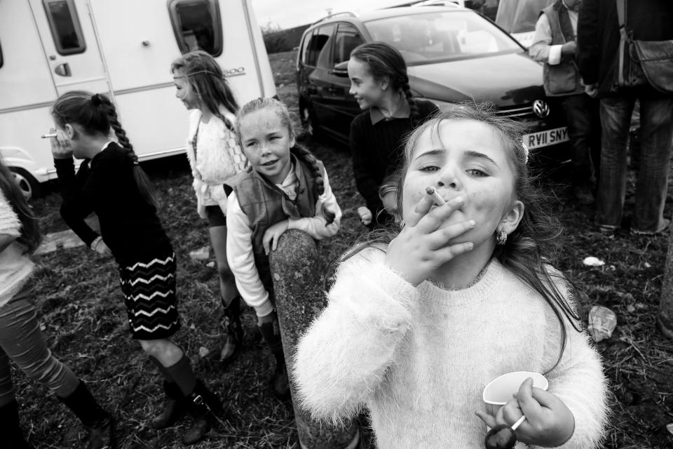  Feigning a smoke is a fun game for this group of girls